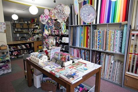 Sew Crafty We Are Ten Sewing Shop Fabric Shelves Table Books