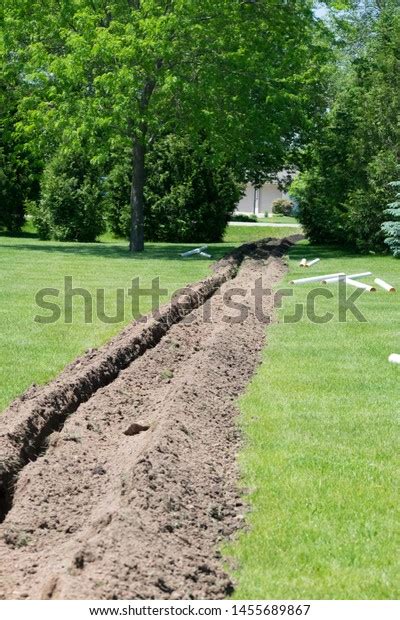 Trench Dug Green Yard By Trench Stock Photo Edit Now 1455689867