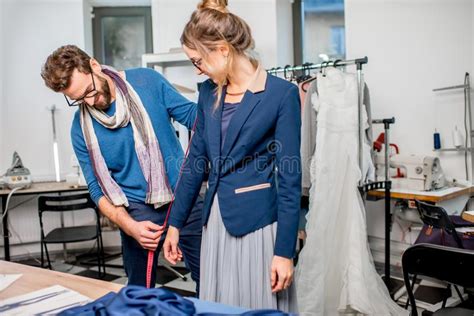 Tailor Fitting Jacket On A Woman Client Stock Photo Image Of Room