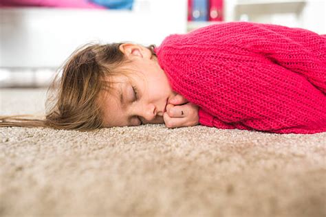 Kids Sleeping On Floor Stock Photos Pictures And Royalty Free Images