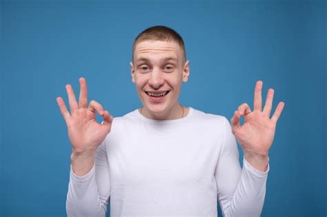 Premium Photo Happy Young Man With Ok Hand Signs