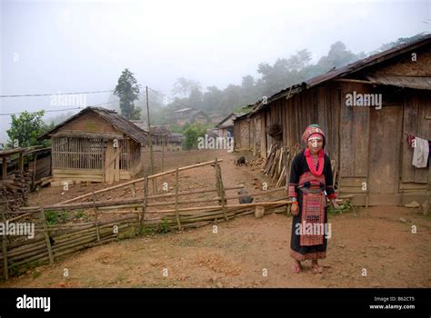 Young Woman Of The Akha Pala Tribe Wearing Traditional Colourful