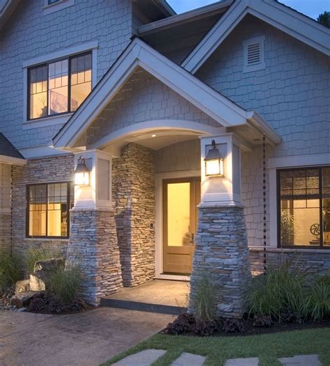 Cultured stone wall is echoed in facing of house. Residential Exterior: Fog SOUTHERN LEDGESTONE - Cultured ...