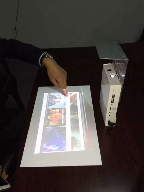 Touch Pico Projector Turns A Wall Into A Touch Screen View Dlp Mini