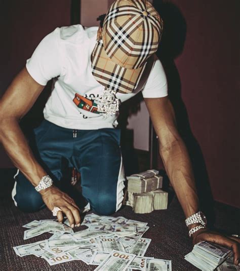 Rappers Holding Money