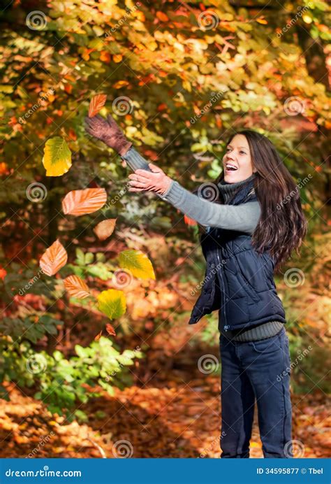 Woman Catching Leaves Stock Image Image Of Outdoors 34595877