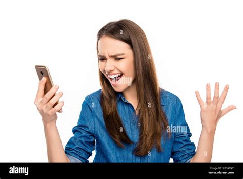 Shocked Frustrated Young Woman Reading Sms And Screamind Stock Photo