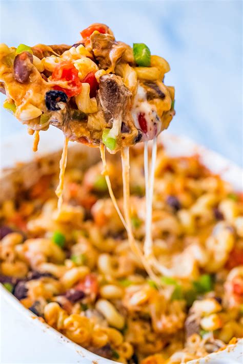 Stir in cream cheese until melted, then stir in 3/4 cup cheddar. Cheesy Taco Pasta Bake