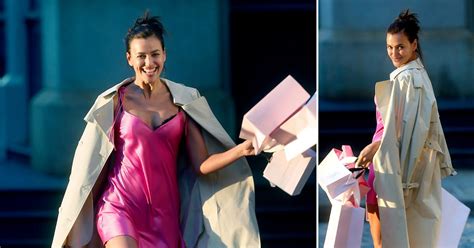 Irina Shayk Models Hot Pink Slip Dress Loafers During Victorias