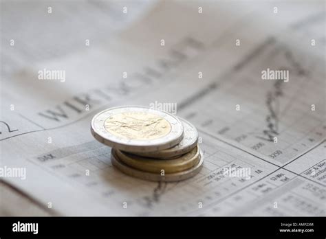 Pile Of Euro Coins On Newspaper Stock Photo Alamy