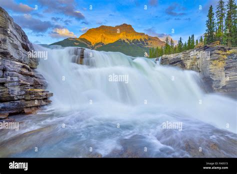 Athabasca Falls At Dusk With Mount Kerkeslin In Jasper National Park