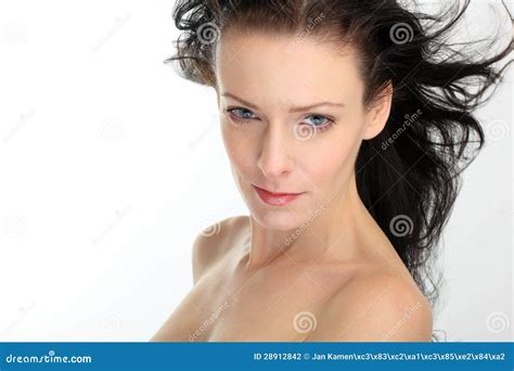 Beautiful Brunette Woman With Flying Hair On White Background Stock