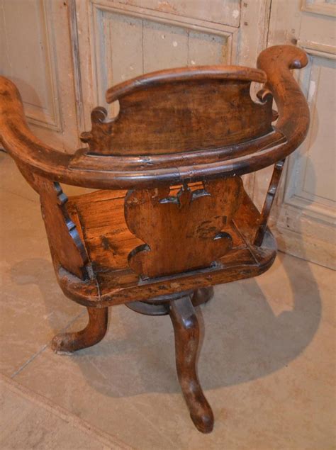 Green tanker office chair from lyon, illinois, usa, 1950s. 19th Century Swiss Hand Carved Wood Swivel Desk Chair For Sale at 1stdibs
