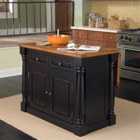 A dark kitchen island serves you well in more ways than one. Kitchen Island in Black and Oak Finish - 5008-94