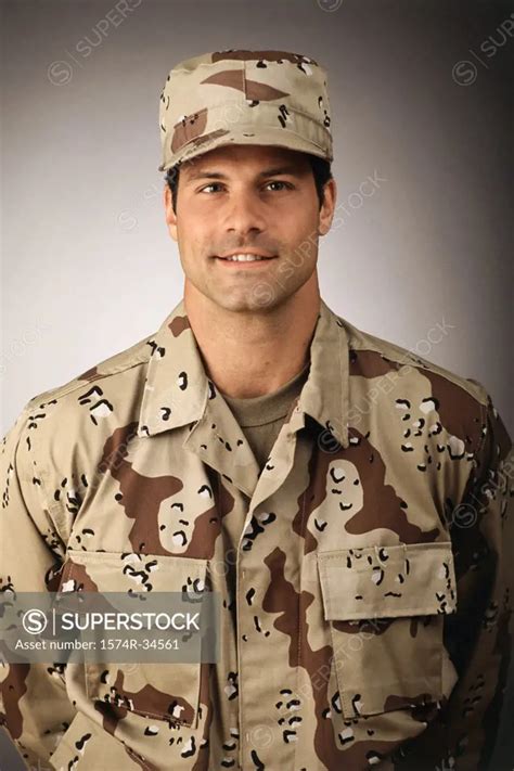 Close Up Of An Army Soldier Smiling Superstock