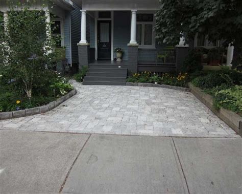 Our driveway fits only one car, so when the other gets home, we every house has a driveway and a space in front. Parking pad for home with no garage | Front walkway ...
