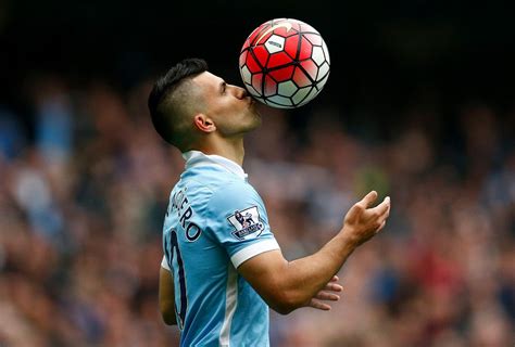Sergio Aguero Of Manchester City Kisses The Ball To Celebrate A Goal During The Barclays Premier