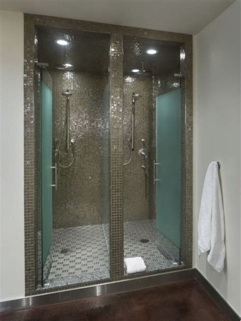 The cost to retile a shower ranges between $1,000 and $3,000. Bathroom Design Ideas including Double Shower with Glass ...