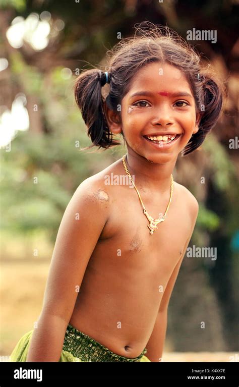 Unidentified Happy Indian Rural Girl Front Of Their House In Village