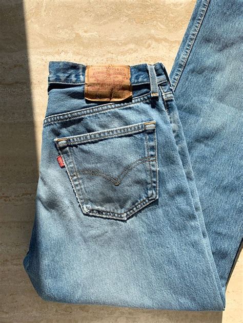 vintage levis 90s jeans high waisted 501 jeans light blue faded 33 x 32 s m in 2020 high