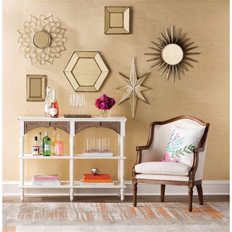 If you'd rather blend the line between art and function, show off with a sunburst mirror. Stratton Home Decor Charlotte Wall Mirror & Reviews | Wayfair