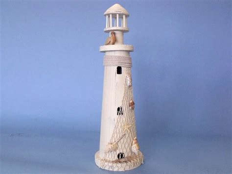 The nautical home, bathroom, garden or boat or as nautical window decor including lighthouse gifts, quirky lighthouse. Wooden Pelican Large Lighthouse 21"