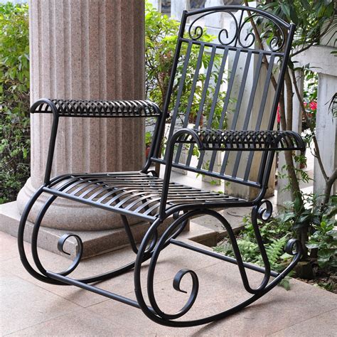 Cute little metal chair to put in your house, porch, or yard. Tropico Wrought Iron Patio Rocker Chair in Black | DCG Stores