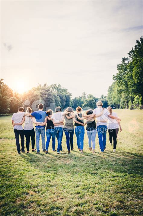 Group Of Friends Walking Together Stock Photo Royalty Free Freeimages