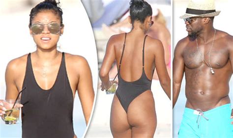 Kevin Hart s new wife Eniko reveals curvaceous derrière in barely there