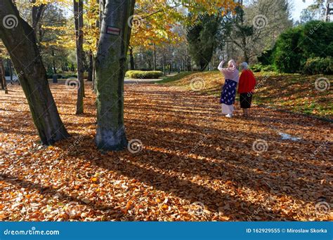 Two Ladies Walking And Talking In The Kosciuszko Park Editorial Image