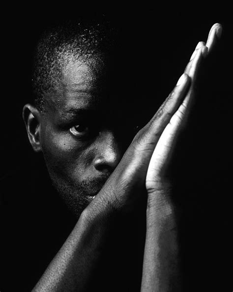 Black Man With Praying Hands Photograph By Martin Sullivan