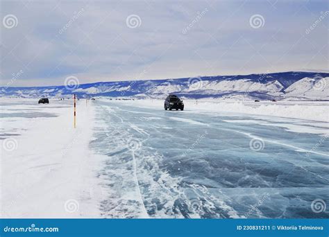 Ice Road On The Frozen Lake Baikal Winter Travel Cars Drive On Ice