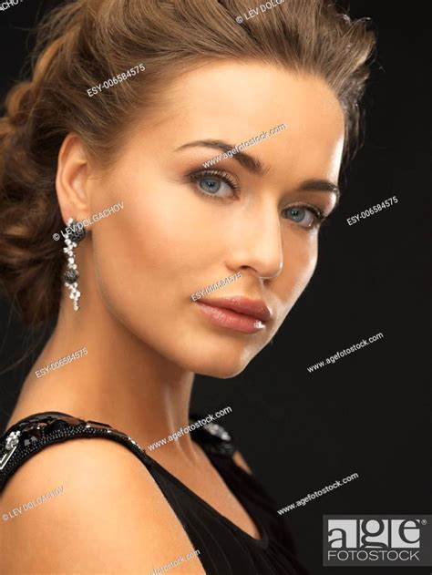 Beautiful Woman In Evening Dress Wearing Diamond Earrings Stock Photo