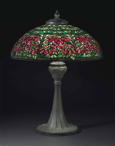 (40 cm.) diameter of shade shade stamped tiffany studios new york 1557, base stamped tiffany studios new. TIFFANY STUDIOS | A 'POINSETTIA' TABLE LAMP, CIRCA 1910 ...