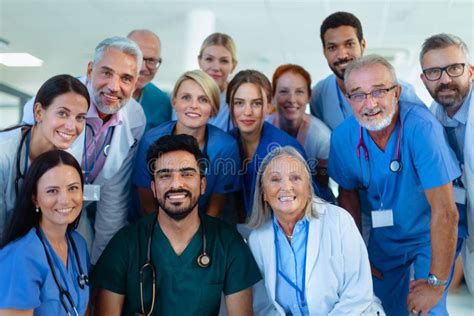 Portrait Of Happy Doctors Nurses And Other Medical Staff In Hospital
