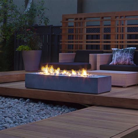 With a fire pit table you can sit longer in your garden, even though the sun has already disappeared below the horizon. Outdoor fire pit ethanol | Outdoor furniture Design and Ideas