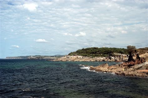 Seacoast Against A Cloudy Sky · Free Stock Photo