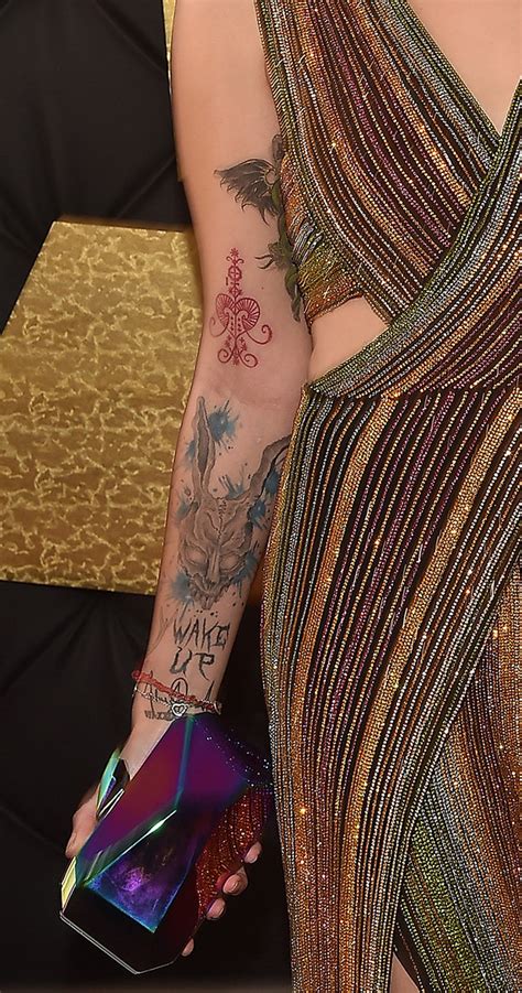 Paris Jackson Displays Tattoo Collection In Skin Baring Jumpsuit On