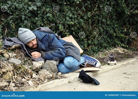 Poor Homeless Man Lying On Street Stock Image Image Of Outdoors