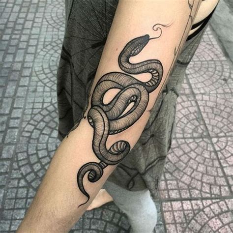 Snake tattoos can either fascinate or cause negative feelings. Scary Snake Tattoose On The Leg - Pin On Full And Half ...