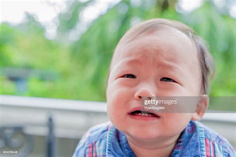 Cute Baby Crying High Res Stock Photo Getty Images