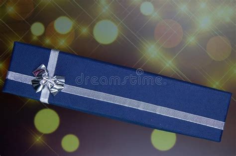 Blue T Box With Silver Bow On Golden Background Stock Image Image