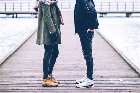 Two People Standing On The Pier Free Stock Photo