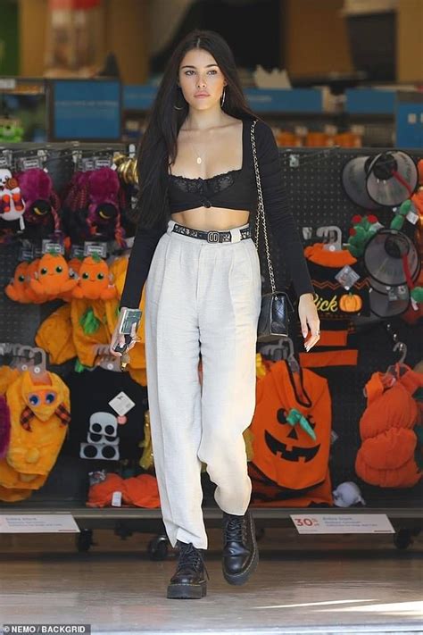 Madison Beer Flashes Midriff And Cleavage In Black Lace Bra As She Runs