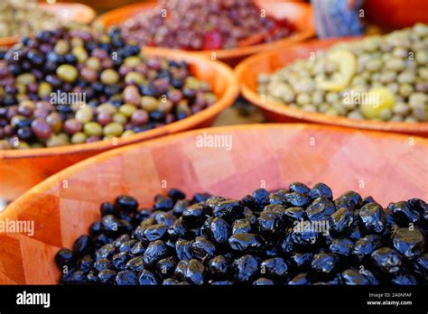 Colorful Bowls Of Marinated Olives At A Food Market Stock Photo Alamy