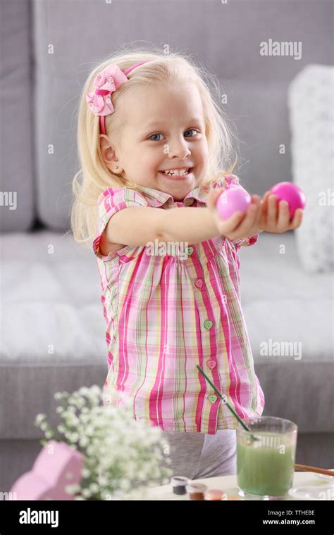 Happy Little Girl Painting Easter Eggs Indoors Stock Photo Alamy