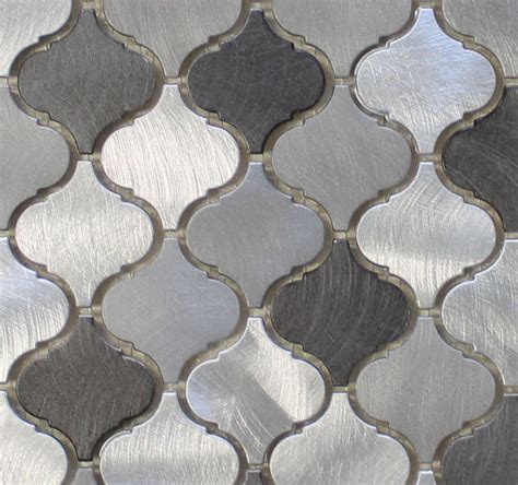 Any ornament or ornamental object, as a rug or mosaic, in which flowers, foliage, fruits, vases, animals, and figures are represented in a fancifully combined pattern. Uptown Brushed Aluminum Arabesque Mosaic Tiles - Rocky ...