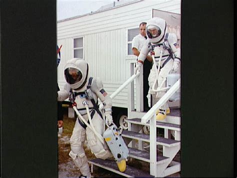 Gemini 7 Prime Crew Leaves Suiting Trailer During Prelaunch Countdown