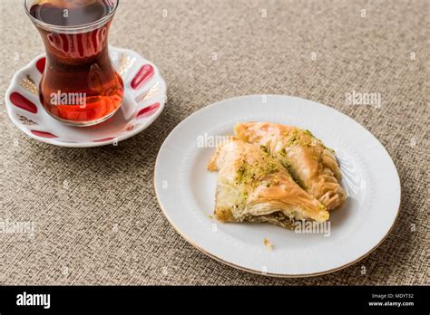 Turkish Baklava Sobiyet With Pistachio And Tea Traditional Dessert