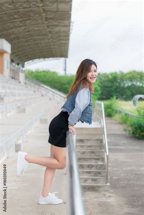 Portrait Of Beautiful Thai Studentcute Asian Girl Outdoorsthailand